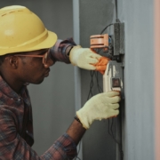 HVAC technician repairing furnace in Chicago home